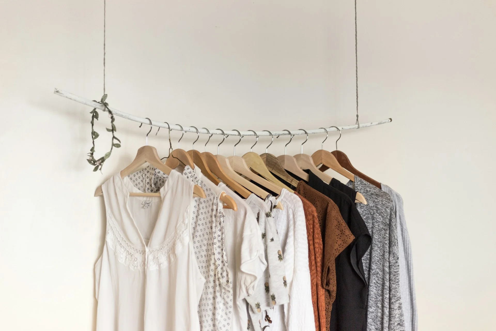Shirts hanging on a clothing rack